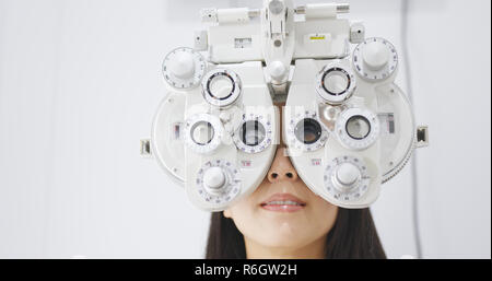 Woman doing eye test Stock Photo