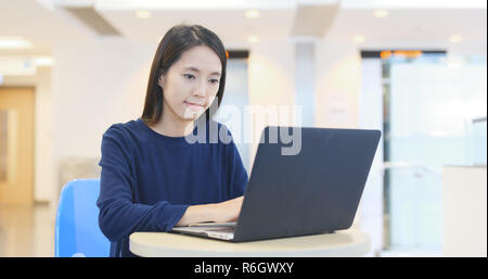 Student study on laptop computer in university campus Stock Photo