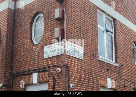 London / UK - March 12 2018: Street Name Signs of Holland Park Avenue and Ladbroke Grove which is located in the Royal Borough of Kensington and Chels Stock Photo