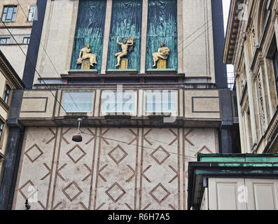 Facade relief bronze sculptures, Staerekassen, Copenhagen, Denmark, Scandinavia. L to R:- Muse of Comedy, Apollo, Muse of Tragedy Stock Photo