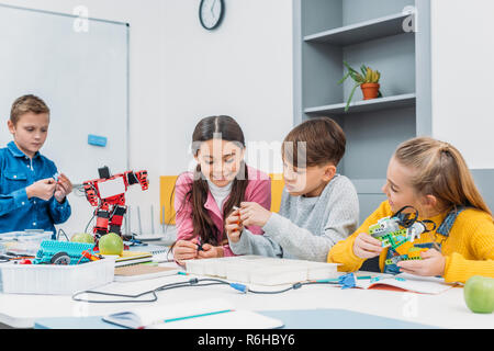 children working together on STEM project in classrom Stock Photo