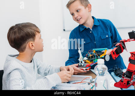 children working together on STEM project in classrom Stock Photo