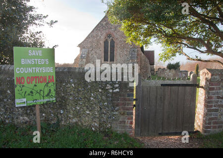 No Option 5A protest sign outside St. Mary's church objecting to the new Arundel bypass, Binsted, West Sussex. Binsted is a village steeped in folklor Stock Photo