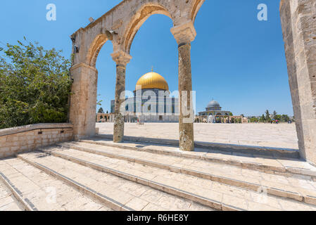 People exploring the Dome of the Rock. It is an Islamic shrine located on the Temple Mount in the Old City of Jerusalem. Stock Photo