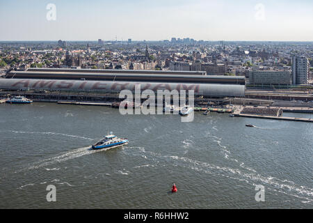 Aerial view medieval city Amsterdam with harbor central railway station Stock Photo