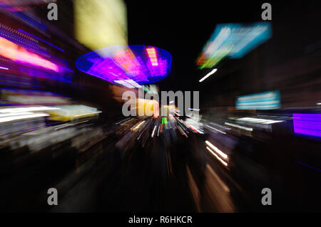 Neon signs on Khao San Road, Bangkok, zoomed in during long exposure at night. Stock Photo