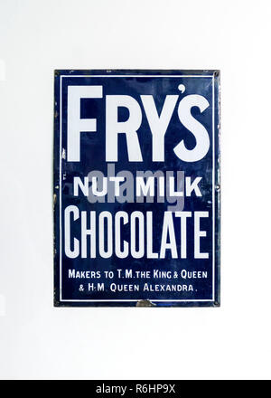 An old metal advertisement for Fry's Nut Milk Chocolate. Stock Photo