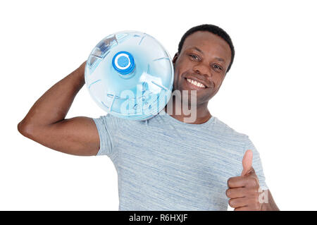 Smiling African man delivering fresh water Stock Photo