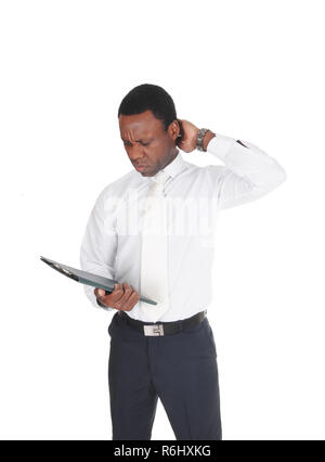 African business man paper, scratching his head Stock Photo