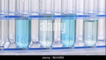 Using Dropper in Laboratory Stock Photo