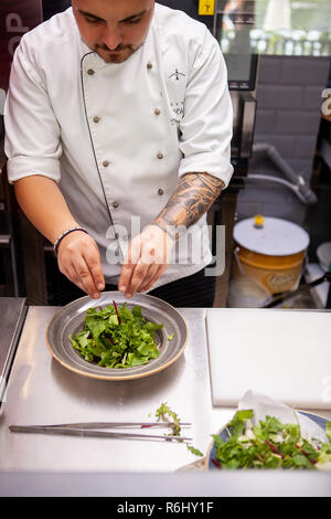 Chef Making delicious salade in restaurant kitchen Stock Photo