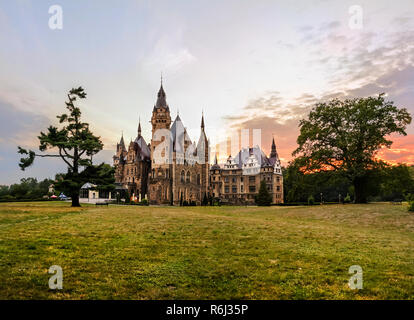 Fabulous castle in Moszna in the evening, Opole, Silesia, Poland Stock Photo