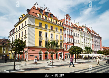WROCLAW POLAND - August  18 2013: People visit Rynek (Market Square) in Wroclaw. Wroclaw is the 4th largest city in Poland with 632067 people (2013). Stock Photo
