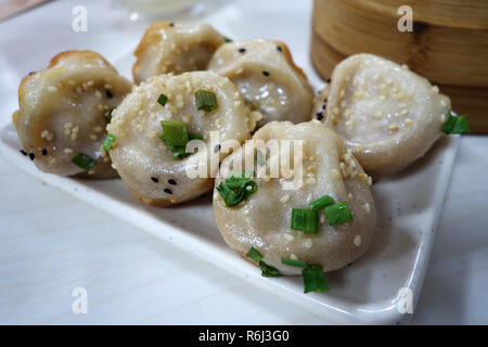 Shanghai pan fried pork dumpling Stock Photo