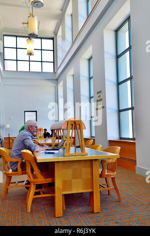 Inside Genealogy Room reading room with study desks of Denver public library Downtown Denver, Colorado, USA Stock Photo