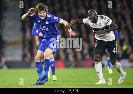 Leicester City's Caglar Soyuncu (left) and Fulham's Aboubakar Kamara battle for the ball during the Premier League match at Craven Cottage, London. Stock Photo