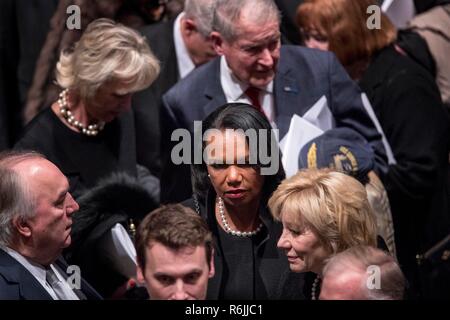 Washington. 5th Dec, 2018. Former Secretary of State Condoleezza Rice, center, departs following the State Funeral for former President George H.W. Bush at the National Cathedral, Wednesday, Dec. 5, 2018, in Washington. Credit: Andrew Harnik/Pool via CNP | usage worldwide Credit: dpa/Alamy Live News Stock Photo