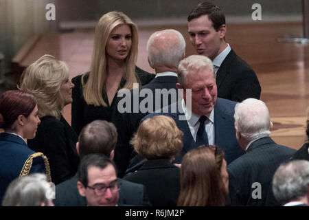 Former Vice President Joe Biden, fourth from left, and his wife Jill Biden, second from left, speak with Ivanka Trump, the daughter of President Donald Trump, third from left, and her husband, President Donald Trump's White House Senior Adviser Jared Kushner, third from right, as former Vice President Al Gore, second from right, speak to former President Jimmy Carter, right, and former first lady Rosalynn Carter, bottom center, before a State Funeral for former President George H.W. Bush at the National Cathedral, Wednesday, Dec. 5, 2018,  in Washington.  Credit: Andrew Harnik / Pool via CNP / Stock Photo