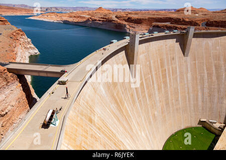 Glen Canyon Dam is a concrete arch-gravity dam on the Colorado River in northern Arizona, United States, near the town of Page. The 710-foot high dam Stock Photo