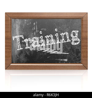 Training text written on blackboard Stock Photo