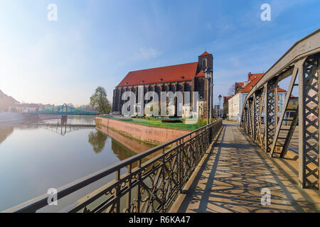 View on the church of the Virgin Mary from the Millstone bridge in Wroclaw. Poland. Stock Photo