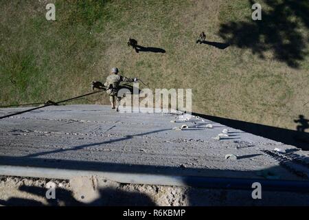 Greek paratroopers with 1st Paratrooper Commando Brigade, Greek Army conduct rappelling training for Sky Soldiers from B Company, 1st Battalion, 503rd Infantry Regiment, 173rd Airborne Brigade, May 20, 2017 in Camp Rentina, Greece as a part of Exercise Bayonet Minotaur 2017. Bayonet-Minotaur is a bilateral training exercise between U.S. Soldiers assigned to 173rd Airborne Brigade and the Greek Armed Forces, focused on enhancing NATO operational standards and developing individual technical skills. Stock Photo