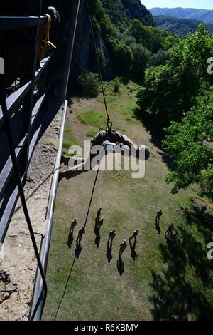 Greek paratroopers with 1st Paratrooper Commando Brigade, Greek Army conduct rappelling training for Sky Soldiers from B Company, 1st Battalion, 503rd Infantry Regiment, 173rd Airborne Brigade, May 20, 2017 in Camp Rentina, Greece as a part of Exercise Bayonet Minotaur 2017. Bayonet-Minotaur is a bilateral training exercise between U.S. Soldiers assigned to 173rd Airborne Brigade and the Greek Armed Forces, focused on enhancing NATO operational standards and developing individual technical skills. Stock Photo