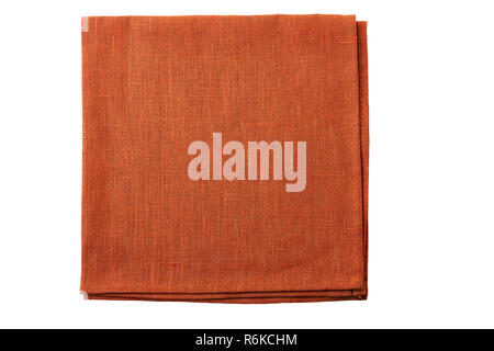 Folded natural brown textile napkin isolated on white background Stock Photo
