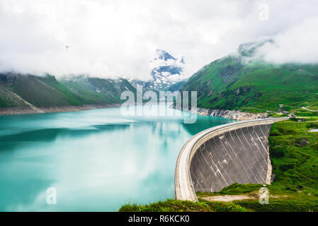 Hydroelectric station at high mountains. Environmentally friendly energy source Stock Photo