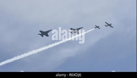 NEWPORT, R.I (May 18, 2017) F/A-18 Hornets assigned to Strike Fighter Squadron (VFA) 106 out of Naval Air Station Oceana, Va., conduct a flyover in Newport, Rhode Island. During their visit to Newport, VFA-106 took part in an air show at the Quonset Point Air National Guard Station. As the east coast fleet replacement squadron, VFA-106’s mission is to train FA-18 replacement aircrew to support fleet commitments. Stock Photo