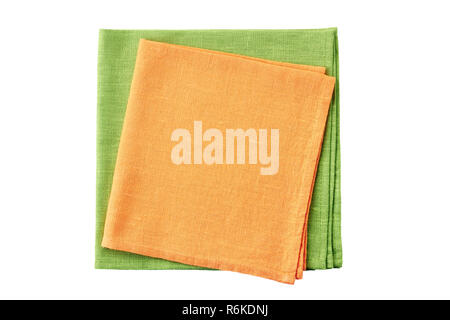 Stack of folded orange and pale green napkins on white Stock Photo