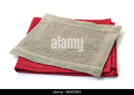 Stack of red and jute napkins on white Stock Photo