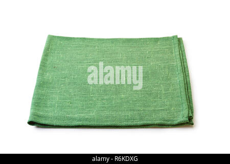 Folded green natural textile napkin on white Stock Photo