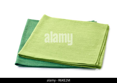 Two green folded textile napkins on white Stock Photo