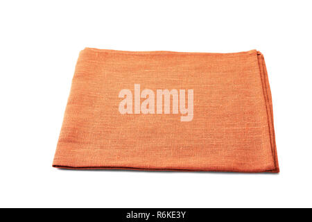 Orange folded textile napkin on white background Stock Photo