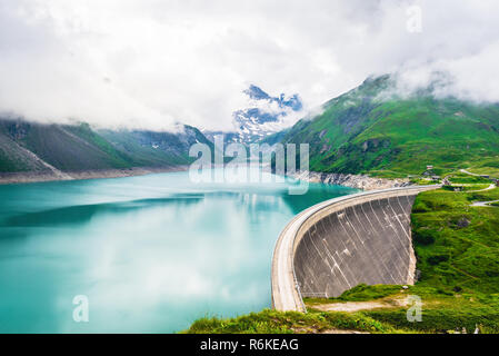 Mooserboden reservoir with hydro power station located at high mountains in Austrian Alps Stock Photo