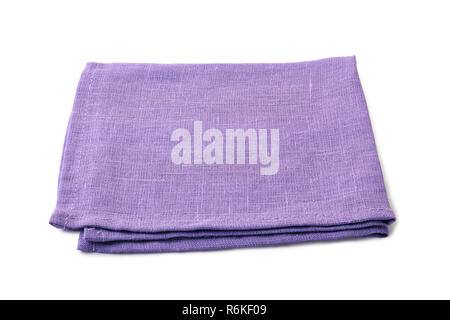 Folded pale violet textile napkin on white background Stock Photo