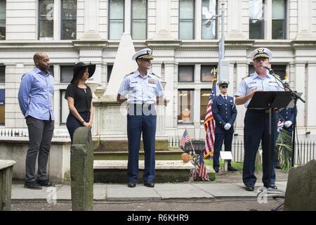 As a part of Fleet Week New York, crew members from the Coast Guard Cutter Hamilton and guests honored Coast Guard founder, Alexander Hamilton, with a memorial wreath-laying ceremony at his grave at Trinity Church in New York City, May 26, 2017. Cast members Brandon Victor Dixon (Aaron Burr) and Lexi Lawson (Eliza Hamilton) of the esteemed Broadway musical, Hamilton also attended and paid their respect for the shared namesake of both the vessel and the play. U.S. Coast Guard Stock Photo