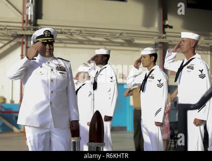 Capt. Stephan Newlund, commander of Patrol and Reconnaissance Wing TWO, is welcomed on stage during the squadron’s disbandment ceremony at Hangar 105 aboard Marine Corps Air Station Kaneohe Bay on May 24, 2017. After 80 years on Oahu, Wing TWO was disestablished and will be reassigned to Wing TEN stationed on Naval Air Station Whidbey Island, Washington. Stock Photo