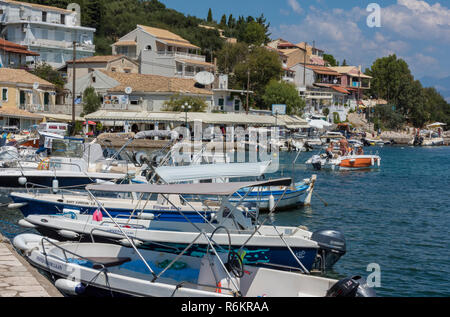 Kassiopi - a fishing village on north-eastern coast of Corfu off the coast  of Albania Stock Photo - Alamy