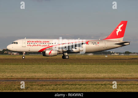 Air Arabia Maroc Airbus A320-200 with registration CN-NMI on take off roll on runway 36L of Amsterdam Airport Schiphol. Stock Photo