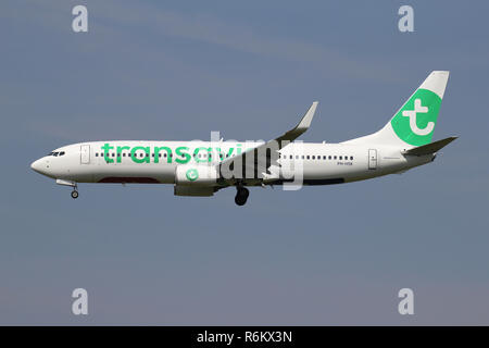 Dutch Transavia Boeing 737-800 with registration PH-HSK on short final for runway 18C of Amsterdam Airport Schiphol. Stock Photo