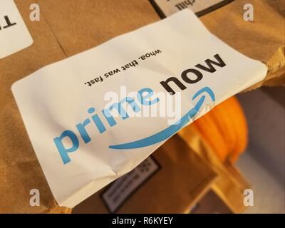 Close-up of logo for Amazon Prime on bag from Prime Now, a same day delivery service for groceries and other retail goods operated by Amazon, San Ramon, California, November 7, 2018. () Stock Photo