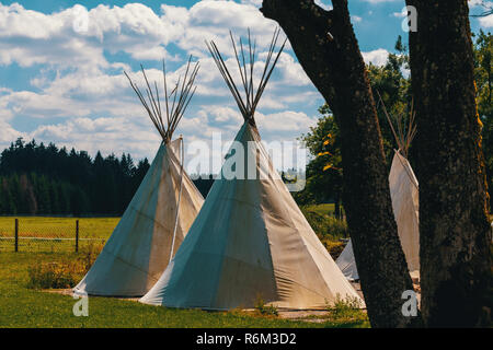 teepee conical tent made from animal skins Stock Photo