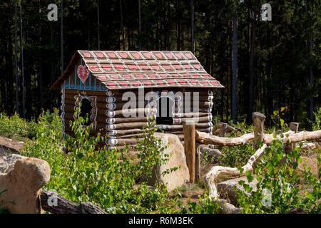 Huts like gingerbread house in forest Stock Photo