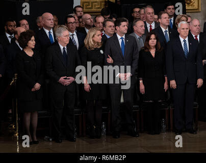 181203-D-AG490-0497 WASHINGTON (Dec. 3, 2018) U.S. government leaders stand and wait for the arrival of the casket of George H. W. Bush, the 41st President of the United States, during Bush's arrival ceremony in the U.S. Capitol building's rotunda, Dec. 3, 2018. Nearly 4,000 military and civilian personnel from across all branches of the U.S. armed forces, including Reserve and National Guard components, provided ceremonial and civil affairs support during Bush's state funeral. (DoD photo by U.S. Navy Mass Communication Specialist 3rd Class Maxwell Anderson/Released) Stock Photo