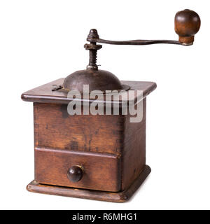 Old wooden coffee grinder with closed drawer. Isolated on white background, with clipping path Stock Photo