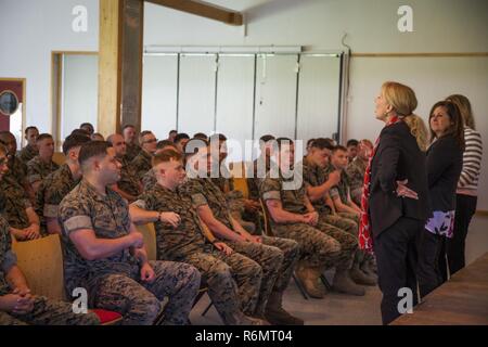 Gail Walters, wife of Gen. Glenn Walters, the Assistant Commandant of the Marine Corps, along with the wives of Sgt. Maj. Robert VanOostrom, the sergeant major of Manpower and Reserve Affairs and Lt. Gen. Michael Dana, deputy commandant of Installations and Logistics, addresses the married Marines and sailors of Marine Rotational Force Europe 17.1 in Værnes Garnison, Norway, May 29, 2017. The ladies talked with Marines about strategies for keeping in touch with spouses and children back home during deployment. Stock Photo