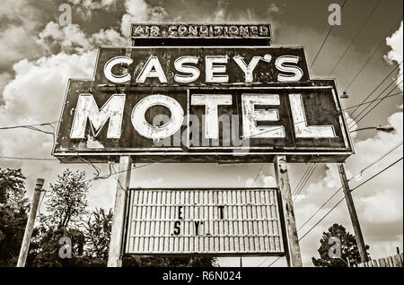A rusting sign advertises Casey’s Motel on Elvis Presley Boulevard, Sept. 3, 2015, in Memphis, Tennessee.