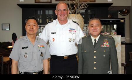 Gen. Robert B. Brown (center), Commanding General, U.S. Army Pacific, held the early morning tri-lateral meeting, in Honolulu, Hawaii, with General Jang Jun-Gyu (left), Chief of Staff of the Republic of Korea Army, and General Toshiya Okabe (right), Chief of Staff, Japan Ground Self-Defense Force, prior to the start of the 2017 Land Forces Pacific Symposium on May 23, 2017. USARPAC's commitment to the defense of its allies, the Republic of Korea and Japan, is ironclad. Stock Photo